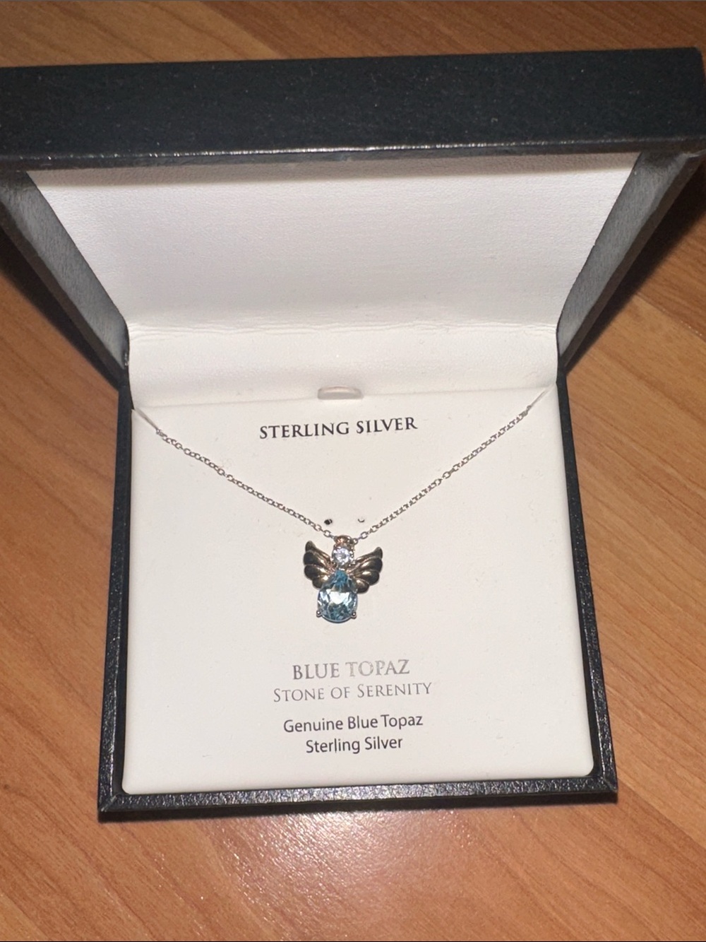 Sterling Silver Blue Topaz Angel Pendant Necklace